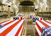 Caskets of American soldiers killed in Iraq being flown back to the United States.