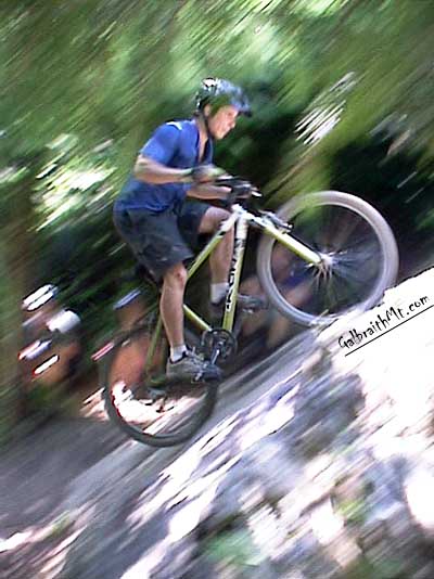 Jason Ploskuniak climbing the Little Rock in Cedar Dust on Galbraith Mt. in Bellingham, WA