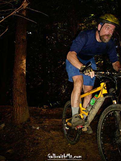 Mongo doing the old double log drop on Galbraith Mt.'s Purple Heart on the Cannondale Jekyll