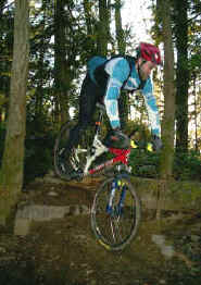 Chris Hardin on the Blow Down Drop on the Ridge Trail on Galbraith Mt.