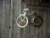 "Old Bike On Wall" by Mongo
