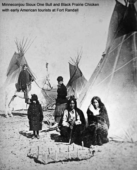 Minneconjou Sioux One Bull and Black Prairie Chicken with early American tourists at Fort Randall